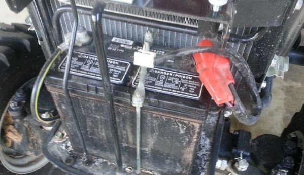 mahindra 4550 corroding battery tray and cables